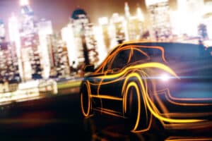 Auto futuristisch vor Skyline als Metapher für die Zukunft des Flottenleasingmarkts in Deutschland
